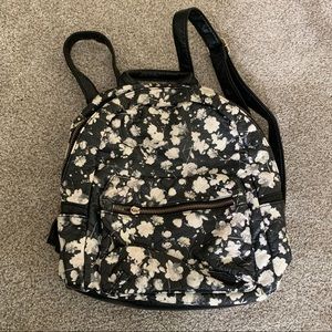 Small backpack/purse. Black with white flowers